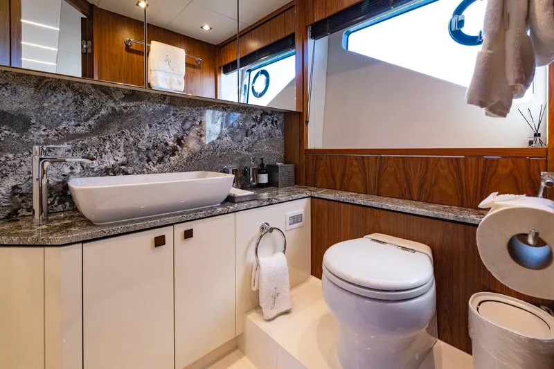 Kb Jr Yacht Photos Pics Luxurious bathroom in 2020 Sunseeker Predator 74 yacht with modern fixtures and elegant design.