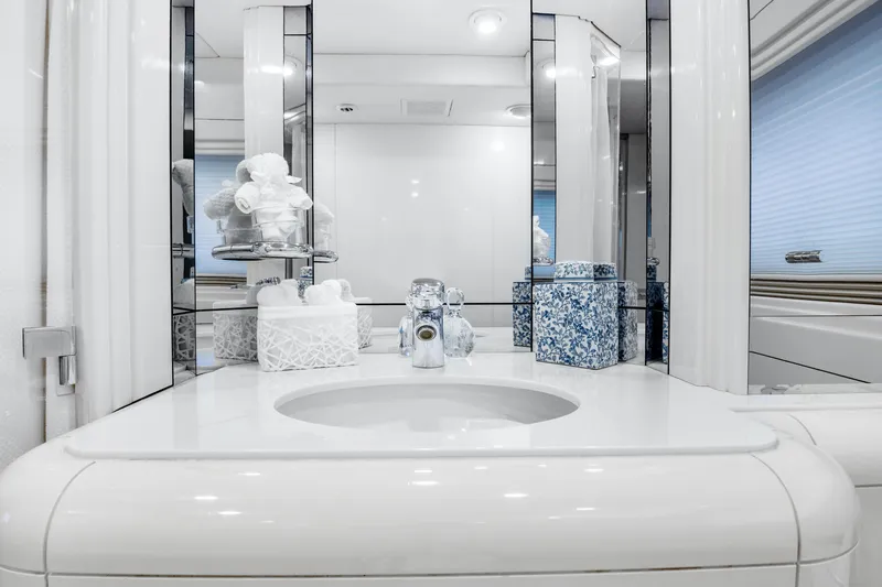  Yacht Photos Pics Luxurious bathroom on a 1989 Oceanfast Motor Yacht with elegant fixtures and decor.