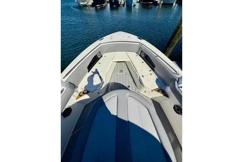 Ghost Rider Yacht Photos Pics 2024 Boston Whaler 360 Outrage boat interior with seating and deck view.