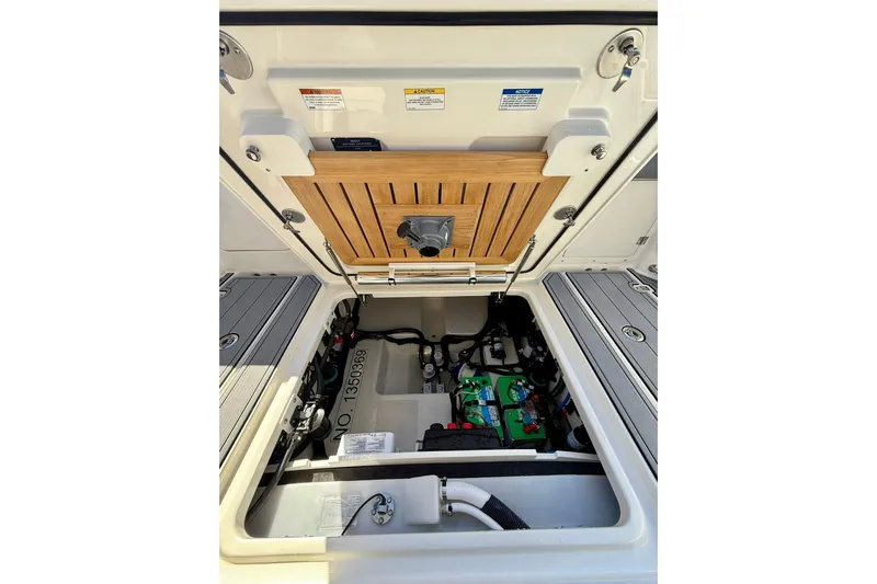 Ghost Rider Yacht Photos Pics 2024 Boston Whaler 360 Outrage engine compartment with visible components and wiring.