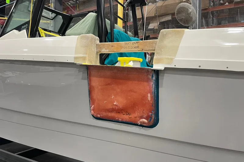 Ghost Rider Yacht Photos Pics 2024 Boston Whaler 360 Outrage boat under construction in a workshop.
