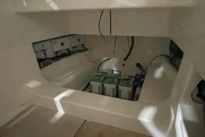 Ghost Rider Yacht Photos Pics 2024 Boston Whaler 360 Outrage battery compartment with wiring and equipment.