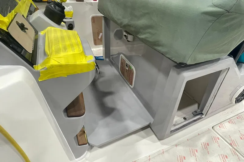 Ghost Rider Yacht Photos Pics 2024 Boston Whaler 360 Outrage boat interior with protective coverings and equipment.