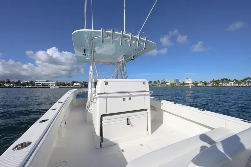  Yacht Photos Pics 2022 SeaVee 340Z boat on water, clear sky, coastal view.