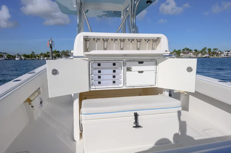  Yacht Photos Pics 2022 SeaVee 340Z boat interior with storage compartments open, showcasing fishing rod holders.