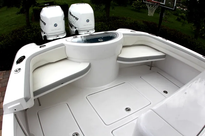  Yacht Photos Pics 2025 Mag Bay 33 boat with twin outboard engines and spacious seating area.