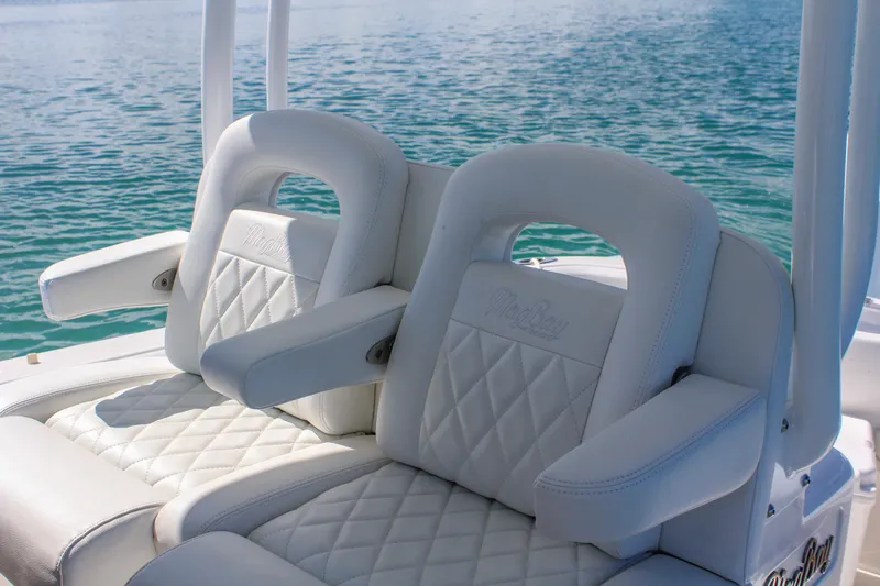  Yacht Photos Pics Luxurious seating on the 2025 Mag Bay 33 boat with diamond-stitched upholstery.