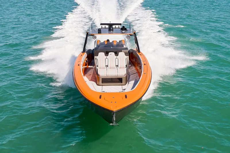 Va Va Vroom Yacht Photos Pics 2020 Midnight Express 43' Open boat cruising on clear blue water.