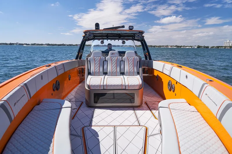 Va Va Vroom Yacht Photos Pics 2020 Midnight Express 43' Open boat with orange and white interior on the water.