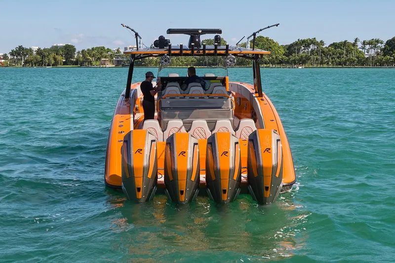 Va Va Vroom Yacht Photos Pics 2020 Midnight Express 43' Open boat with four powerful engines on turquoise water.