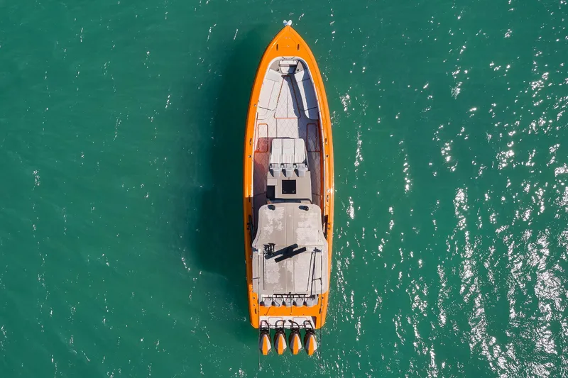 Va Va Vroom Yacht Photos Pics Aerial view of 2020 Midnight Express 43' Open boat on turquoise water.