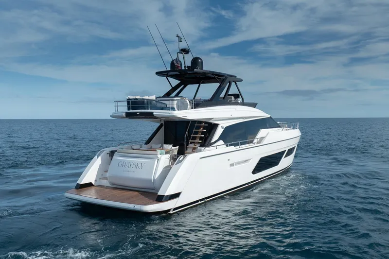  Yacht Photos Pics 2023 Ferretti Yachts 720 cruising on open sea under clear skies.
