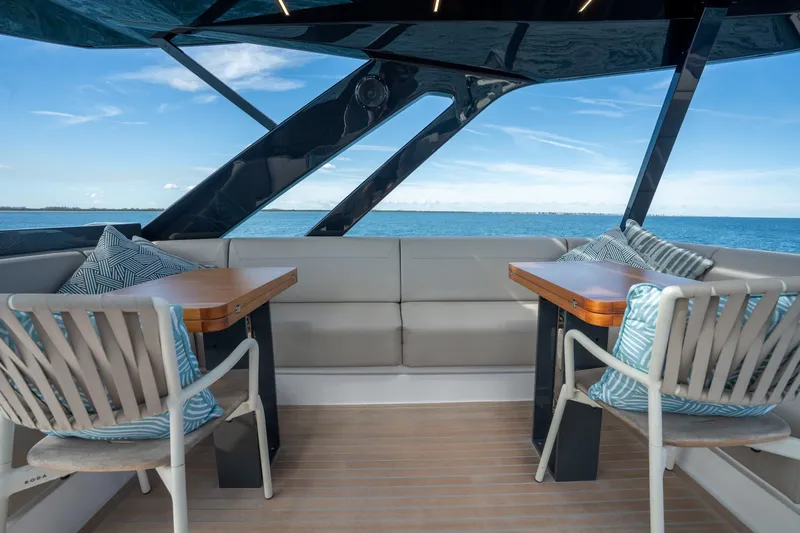 Yacht Photos Pics Luxurious seating area on 2023 Ferretti Yachts 720 with ocean view.