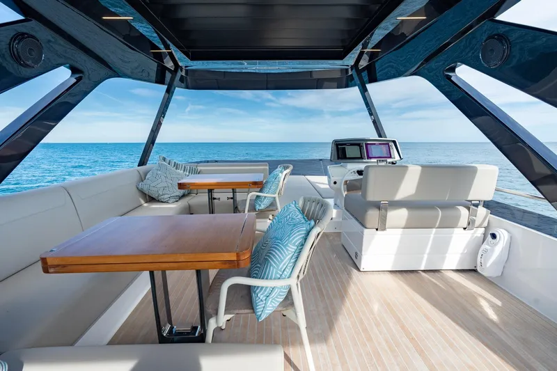  Yacht Photos Pics Luxurious 2023 Ferretti Yachts 720 interior with ocean view, featuring elegant seating and modern design.