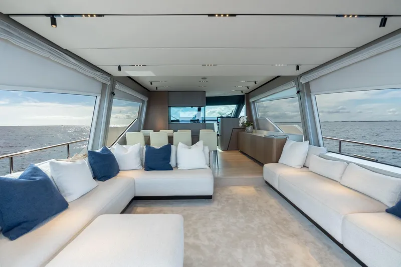  Yacht Photos Pics Luxurious interior of 2023 Ferretti Yachts 720 with ocean view and elegant seating.