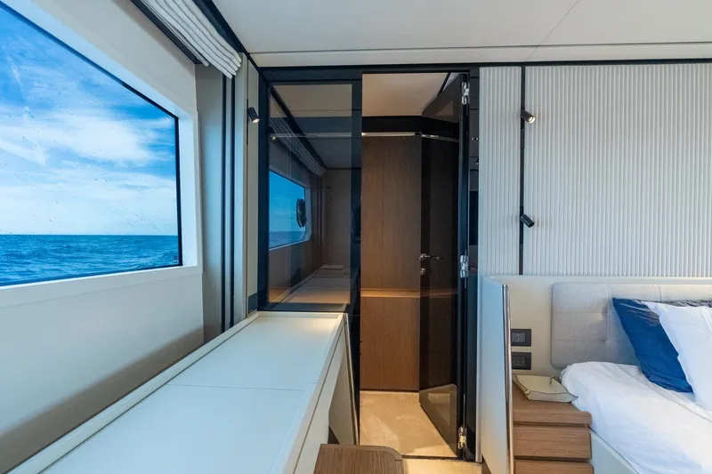  Yacht Photos Pics Luxurious interior of 2023 Ferretti Yachts 720 with ocean view window.