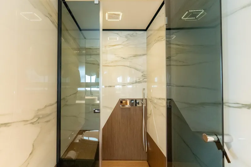  Yacht Photos Pics Luxurious bathroom interior on 2023 Ferretti Yachts 720, featuring elegant marble and modern fixtures.