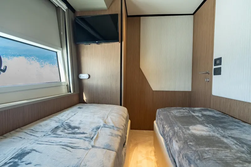  Yacht Photos Pics Luxurious twin cabin interior on 2023 Ferretti Yachts 720 with modern design.