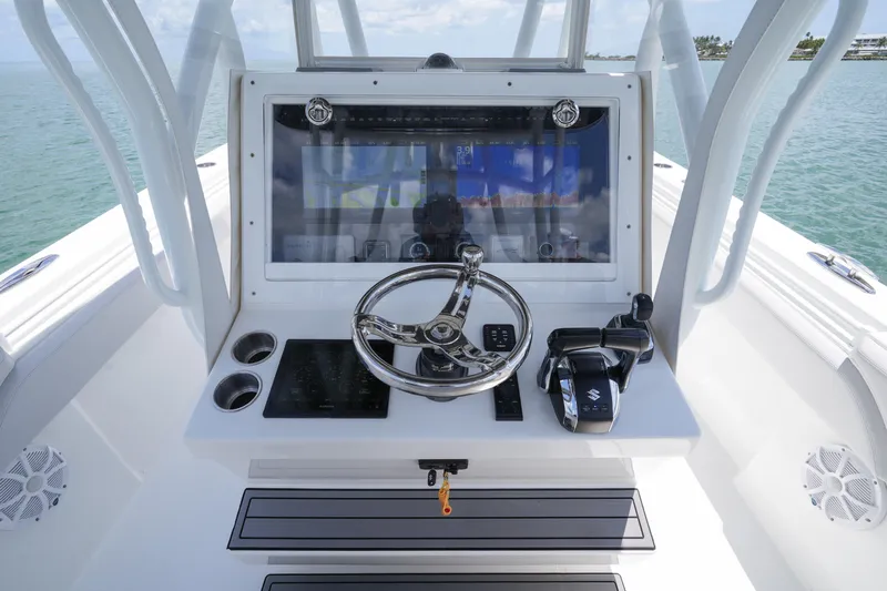  Yacht Photos Pics 2023 SeaHunter 31 Tournament boat helm with advanced navigation and control systems.