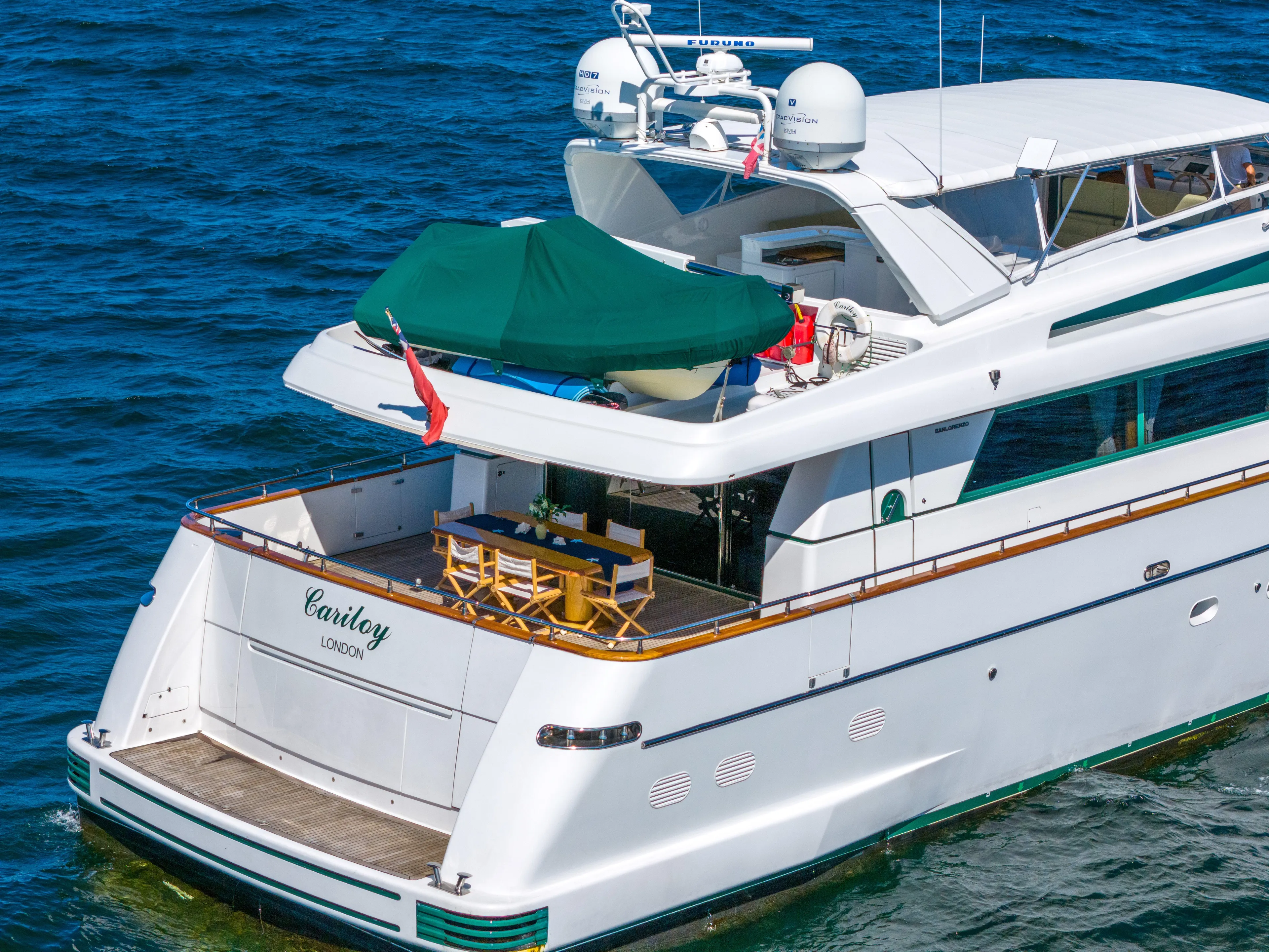  Yacht Photos Pics Sanlorenzo 100SL 1998 yacht on water, featuring a spacious deck and elegant design.