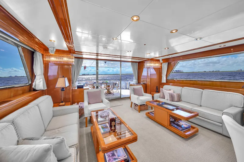  Yacht Photos Pics Luxurious interior of 1998 Sanlorenzo 100SL yacht with elegant seating and ocean view.