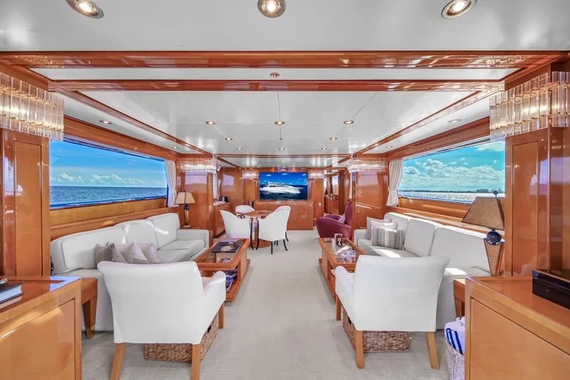  Yacht Photos Pics Luxurious interior of 1998 Sanlorenzo 100SL yacht with elegant seating and ocean views.