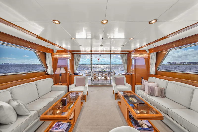  Yacht Photos Pics Luxurious interior of 1998 Sanlorenzo 100SL yacht with elegant seating and ocean views.