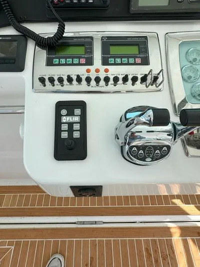 Tuna Daze Yacht Photos Pics Control panel of a 2004 Cabo Express boat with FLIR system and throttle controls.
