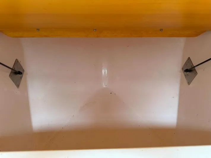 Tuna Daze Yacht Photos Pics Empty storage compartment in a 2004 Cabo Express boat.