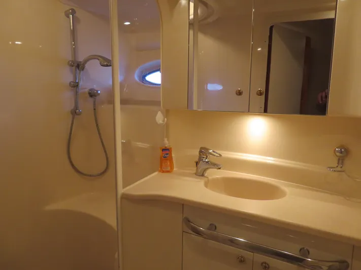  Yacht Photos Pics Luxurious bathroom in 2001 Sea Ray 510DA yacht with shower and sink.