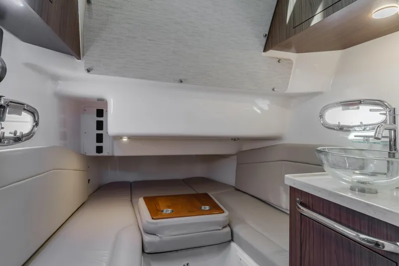Robin Ann Yacht Photos Pics Luxurious interior of 2018 Boston Whaler 380 Outrage boat cabin with modern amenities.