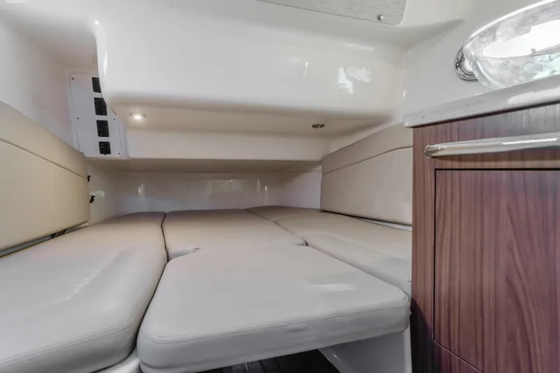 Robin Ann Yacht Photos Pics Interior cabin of 2018 Boston Whaler 380 Outrage with cushioned seating.