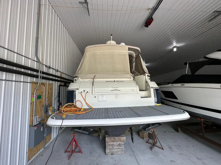  Yacht Photos Pics 2004 Regal Commodore 3860 yacht stored indoors on supports.