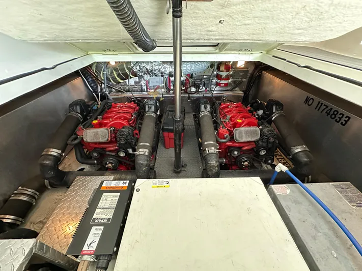  Yacht Photos Pics Engine room of 2004 Regal Commodore 3860 with dual red engines and mechanical components.