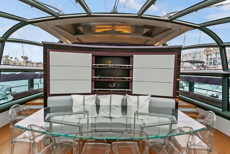 Argonaut Yacht Photos Pics Luxurious 2011 Baia yacht interior with modern seating and glass table.
