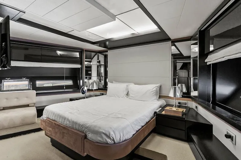 Argonaut Yacht Photos Pics Luxurious bedroom interior on a 2011 Baia yacht, featuring modern design and elegant furnishings.