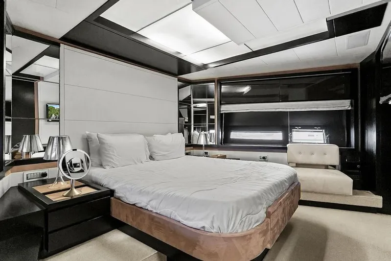 Argonaut Yacht Photos Pics Luxurious bedroom interior on a 2011 Baia yacht, featuring modern design and elegant furnishings.