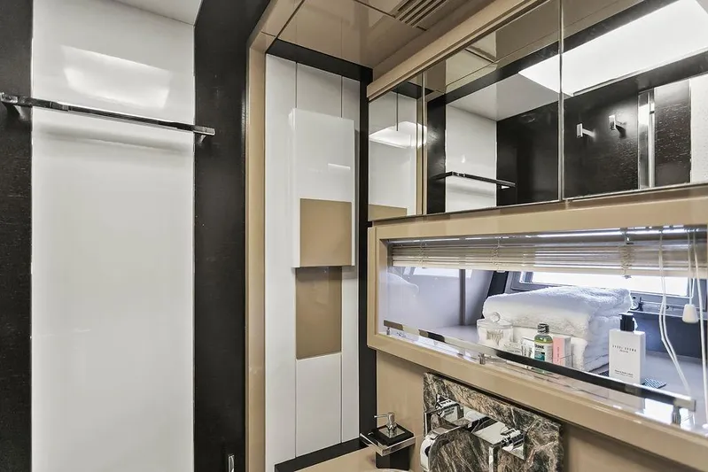 Argonaut Yacht Photos Pics Luxurious bathroom interior of 2011 Baia xxx yacht with modern fixtures and elegant design.