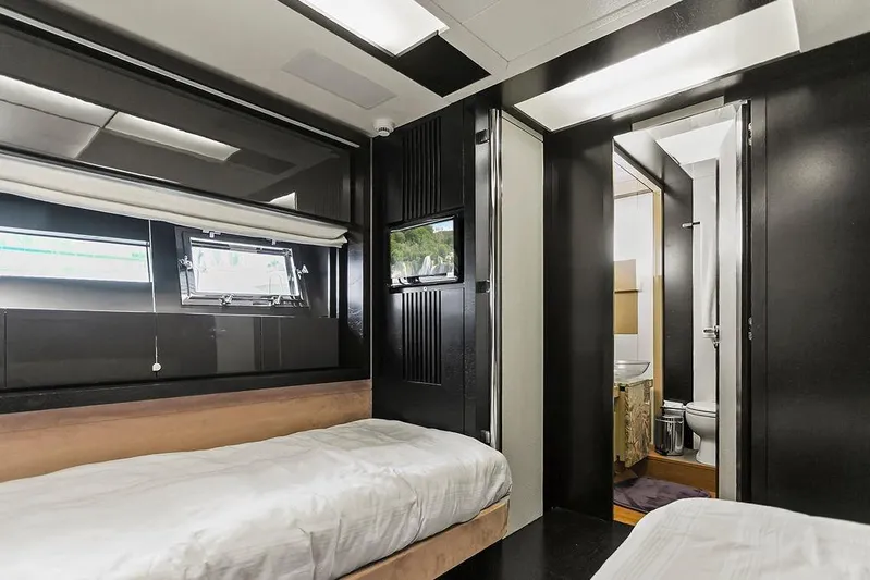 Argonaut Yacht Photos Pics Luxurious 2011 Baia yacht interior with twin beds and modern bathroom.