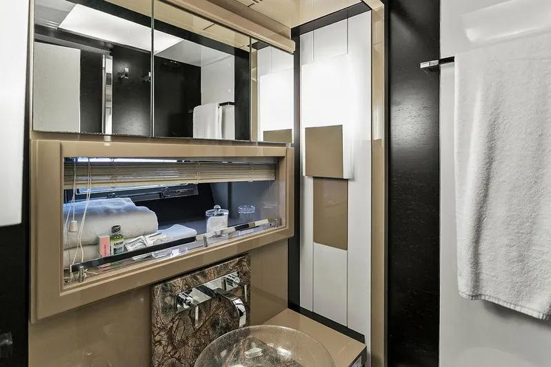 Argonaut Yacht Photos Pics Luxurious bathroom interior of 2011 Baia xxx yacht with modern fixtures and elegant design.