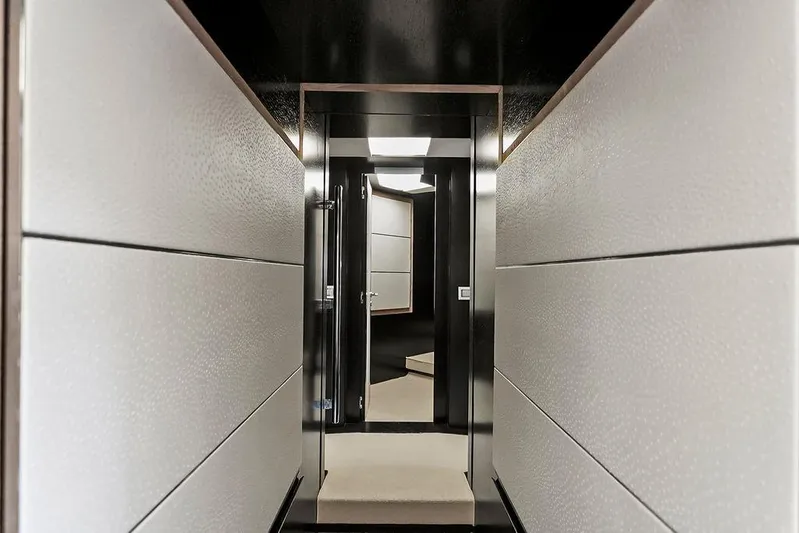 Argonaut Yacht Photos Pics Sleek interior hallway of 2011 Baia xxx yacht, featuring modern design and elegant finishes.