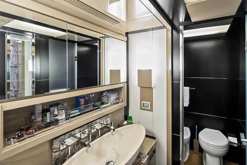 Argonaut Yacht Photos Pics Luxurious yacht bathroom with modern fixtures, sleek design, and ample storage, Baia 2011 model.