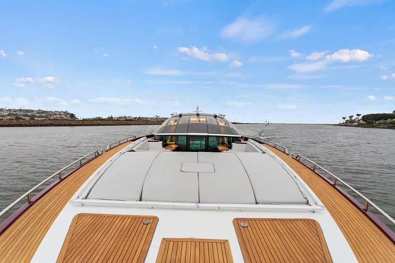 Argonaut Yacht Photos Pics Luxurious 2011 Baia yacht with sleek deck design cruising on open water.