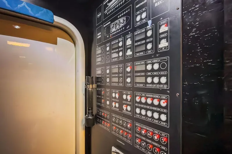 Argonaut Yacht Photos Pics Control panel inside a 2011 Baia model xxx yacht, featuring various switches and indicators.