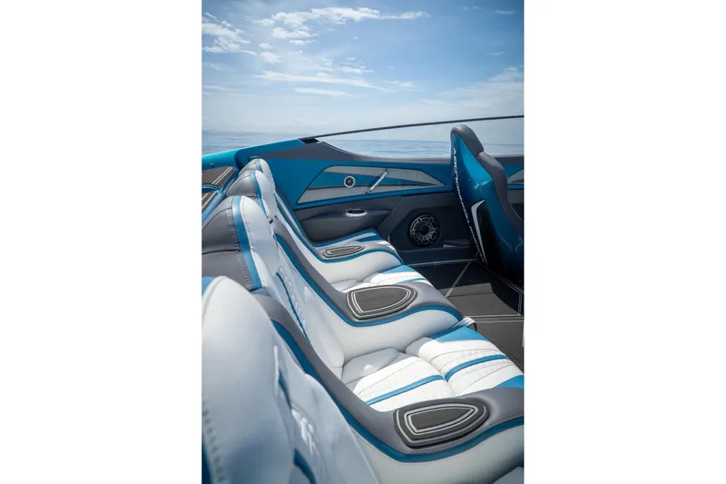  Yacht Photos Pics Luxurious interior of 2024 MTI 440X boat with blue and white seating.