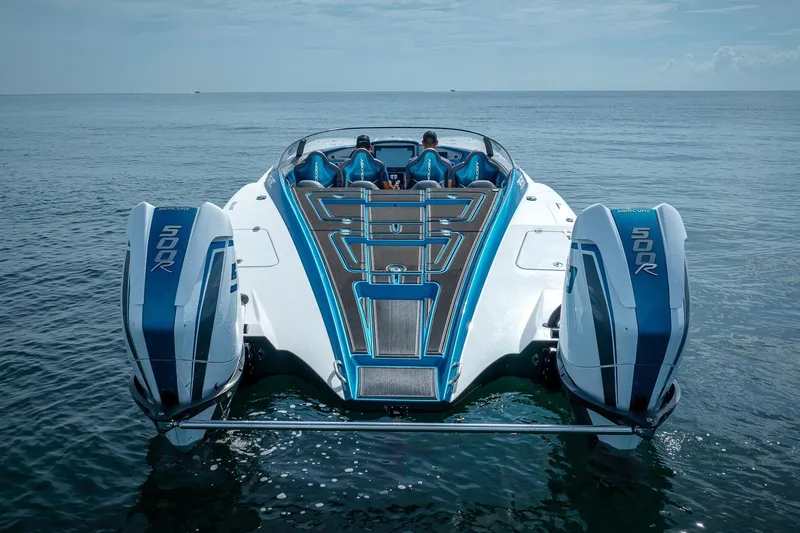  Yacht Photos Pics 2024 MTI 440X powerboat with dual Mercury 500R engines on open water.