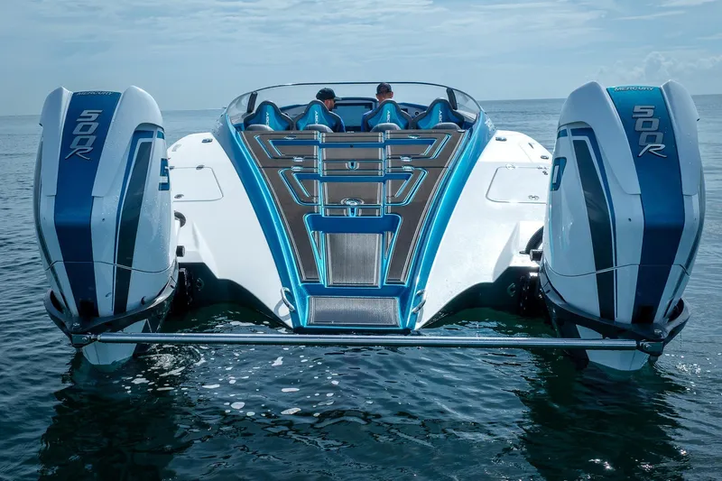  Yacht Photos Pics 2024 MTI 440X powerboat with dual Mercury 500R engines on open water.