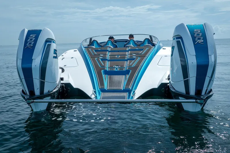  Yacht Photos Pics 2024 MTI 440X powerboat with dual 500R engines on calm water.