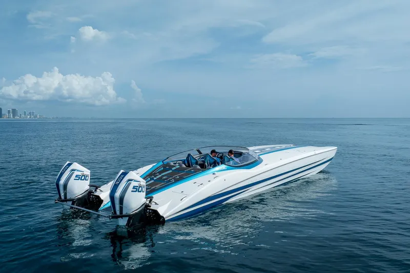  Yacht Photos Pics 2024 MTI 440X powerboat with dual engines cruising on open water.