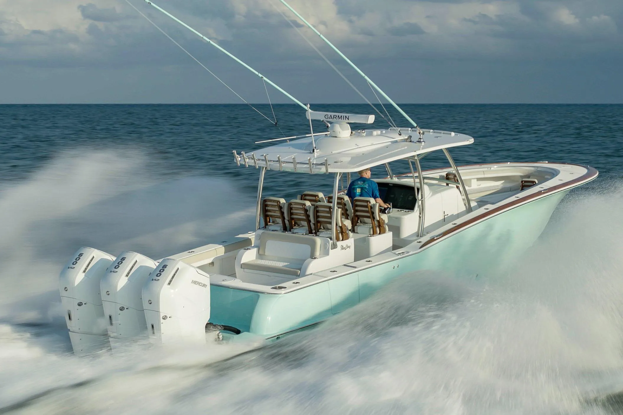 Manufacturer Provided Image: 2025 Mag Bay 43 CC boat cruising on open water with powerful engines.